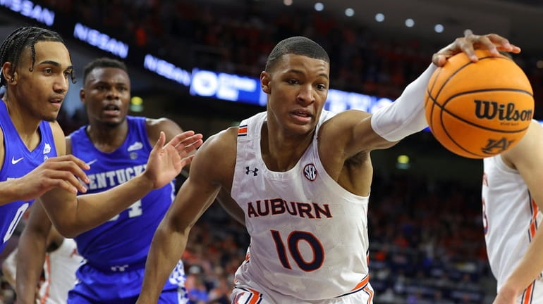 Jabari Smith #10 of the Auburn Tigers rebounds during the...