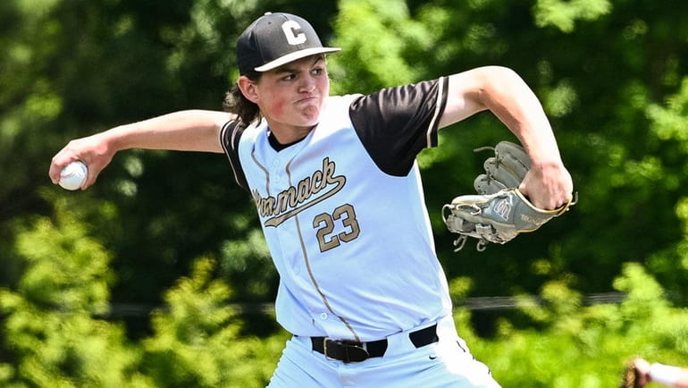 Starting pitcher Evan Kay of Commack pitches against Patchogue-Medford during...