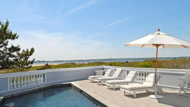 The backyard view of a house in Bridgehampton on the...