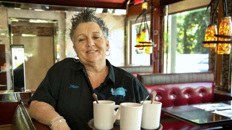 Debra Pure, 55, has been working as a waitress at...