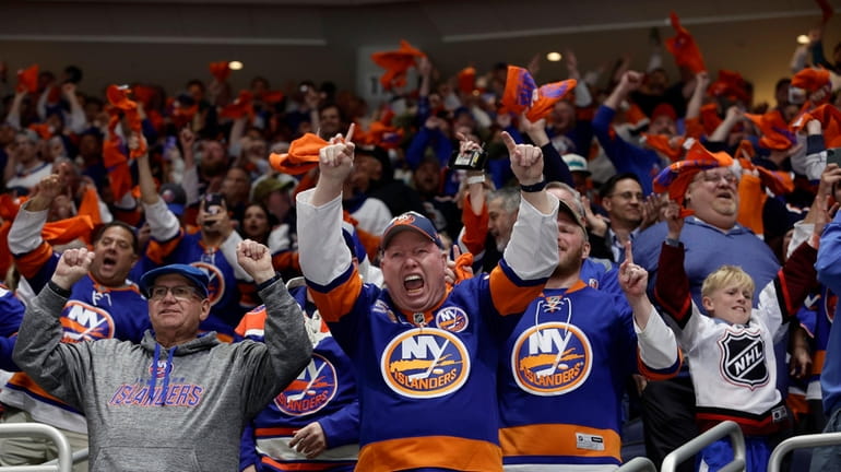 Islanders fans cheer a second period goal against the Carolina...