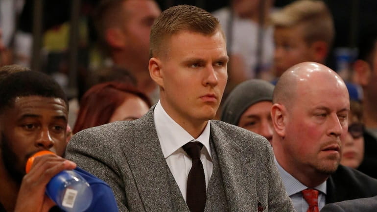 Kristaps Porzingis on the Knicks' bench against the Brooklyn Nets...