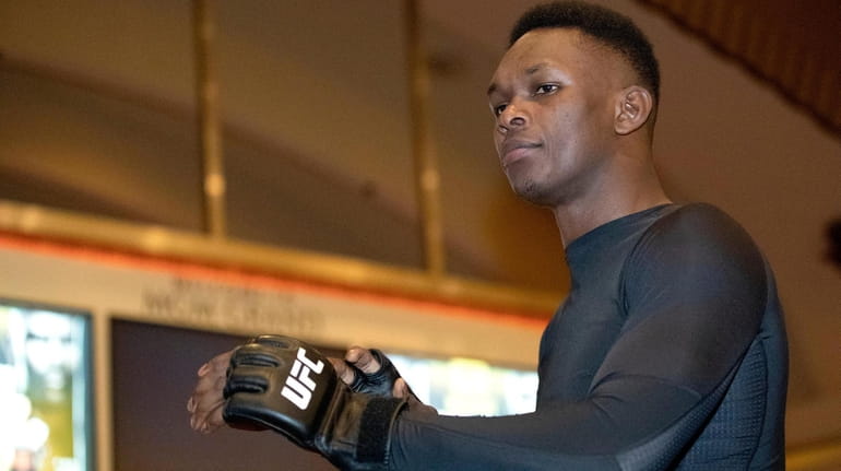 UFC middleweight champion Israel Adesanya, of Nigeria, prepares for a...