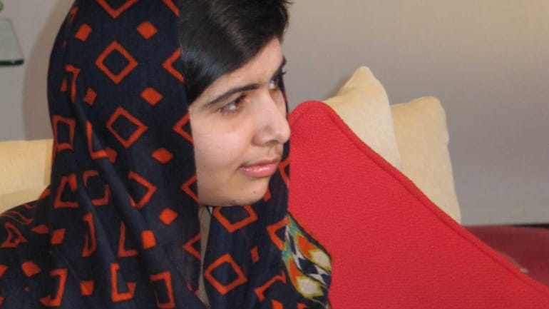 Fifteen-year-old Malala Yousefzai relaxes. The Pakistani girl shot by the...