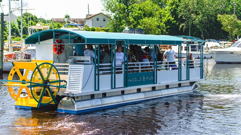 Paddle Pub Long Island, Patchogue, is a pedal-powered boat for...