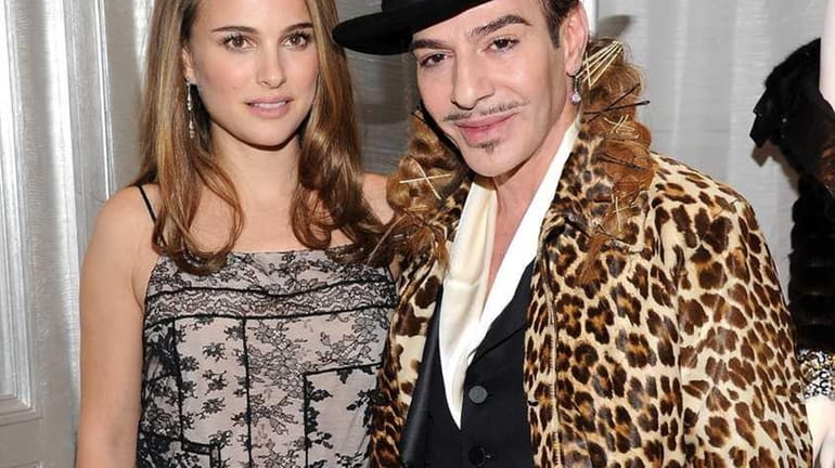 Actress Natalie Portman and designer John Galliano attend the Dior...