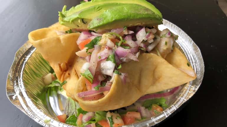 A red-snapper ceviche from Empanadas and More, which has opened...