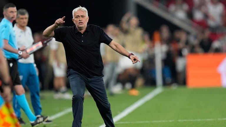 Roma's head coach Jose Mourinho shouts during the Europa League...