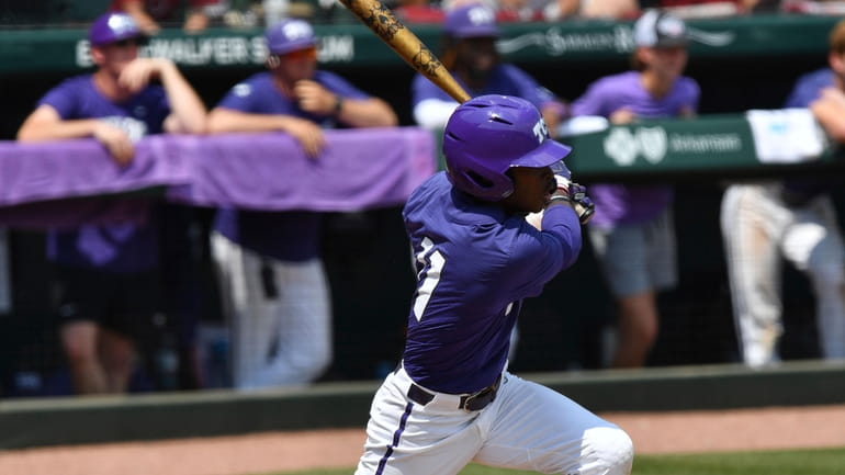 TCU's Austin Davis connects with two-run single against Arkansas during...
