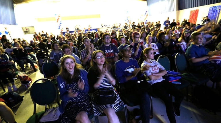 Hofstra students view the presidential debate at the campus recreation...
