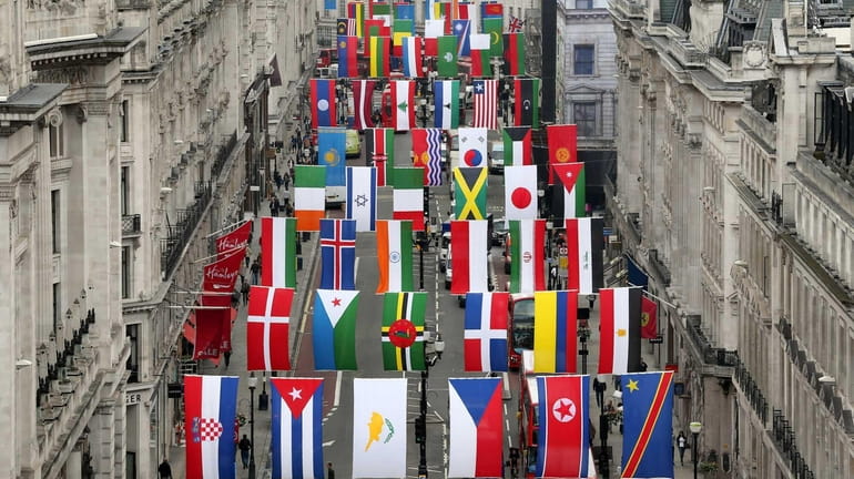 The flags of 200 nations are displayed on Regent Street...