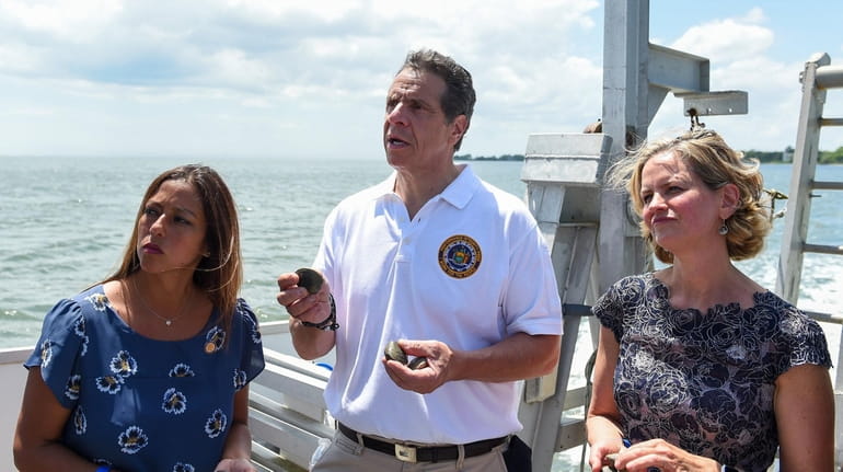 Gov. Andrew M. Cuomo, with state Sen. Monica Martinez (D-Brentwood), left, and Nassau...