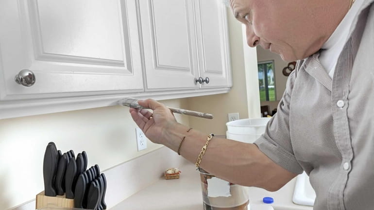 Painting kitchen cabinets can be a cost effective way to...