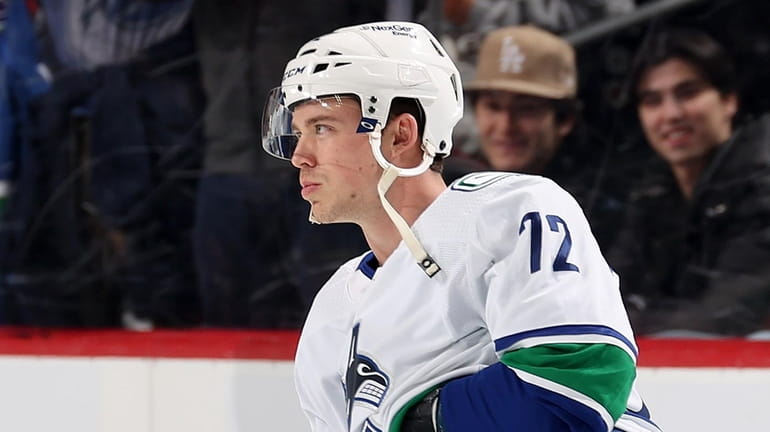 Anthony Beauvillier #72 of the Vancouver Canucks skates for warm...