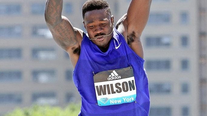 Former Giant David Wilson competes in the men's triple jump...