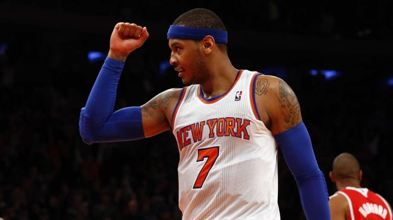 Carmelo Anthony celebrates at the buzzer after defeating the Atlanta...