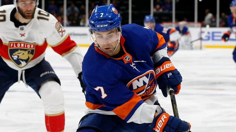 Jordan Eberle of the Islanders skates with the puck during...