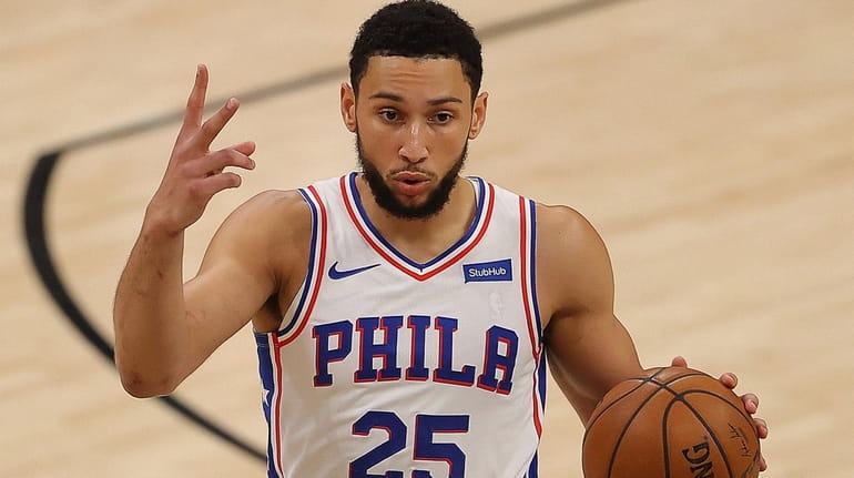 Ben Simmons calls out a play during the first half of...