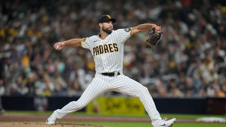 San Diego Padres starting pitcher Michael Wacha works against a...