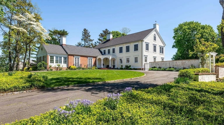Priced at $2 million, this Colonial on Bayville Road has expansive...