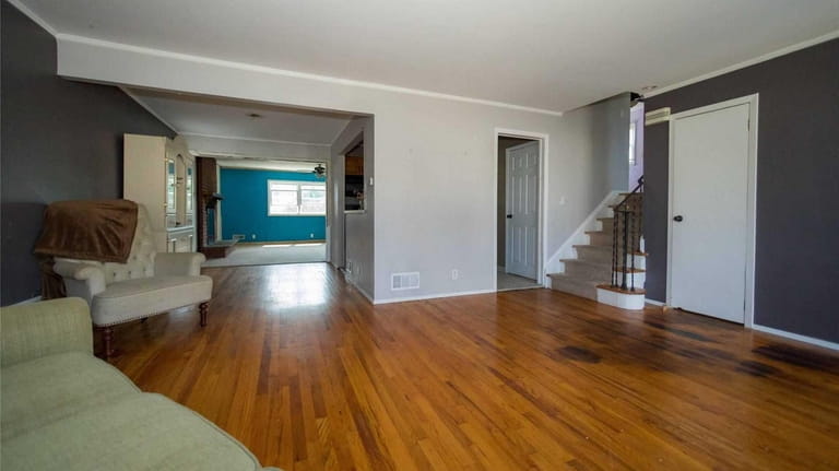 This three-bedroom, 1½-bathroom split-level house in Freeport, listed for $399,000,...