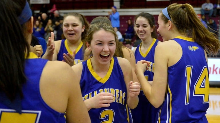 Kellenberg player Alyssa Boll, #2, and her teammates celebrate after...