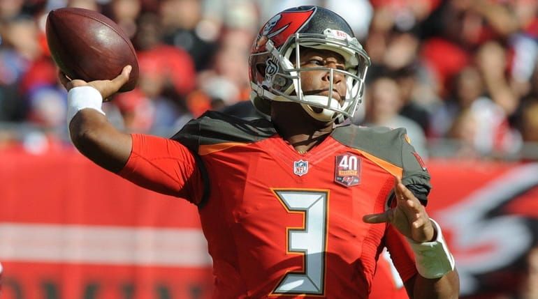 Quarterback Jameis Winston of the Tampa Bay Buccaneers passes the...
