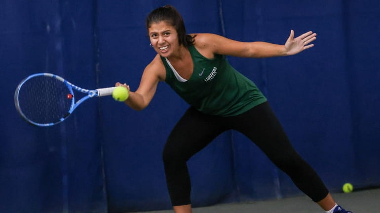 Victoria Matos of Longwood reaches for the serve during the...