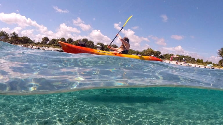 Kayaking off the shore of Peanut Island in West Palm...