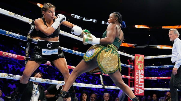 Claressa Shields, right, leans back from Maricela Cornejo during a...