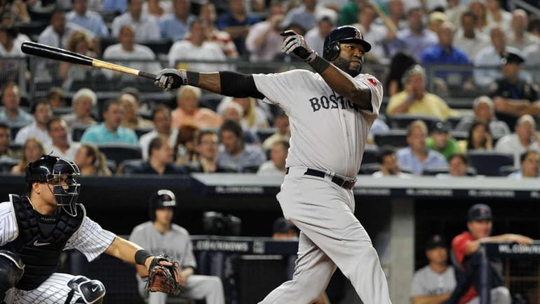 Boston Red Sox designated hitter David Ortiz (34) watches his...