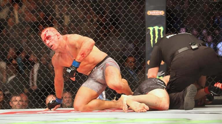 Georges St-Pierre submitted Michael Bisping in the middleweight title fight...