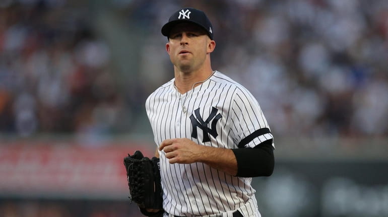 Yankees center fielder Brett Gardner (11) runs in from the...