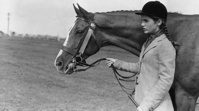 Jackie Kennedy poses with her mare, Danseuse.