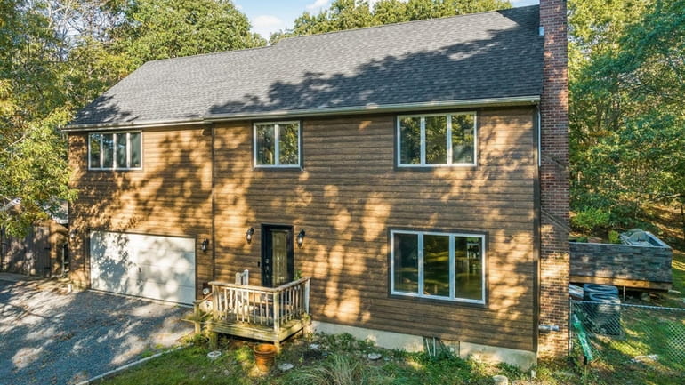 This smart home in Calverton is on the market for...