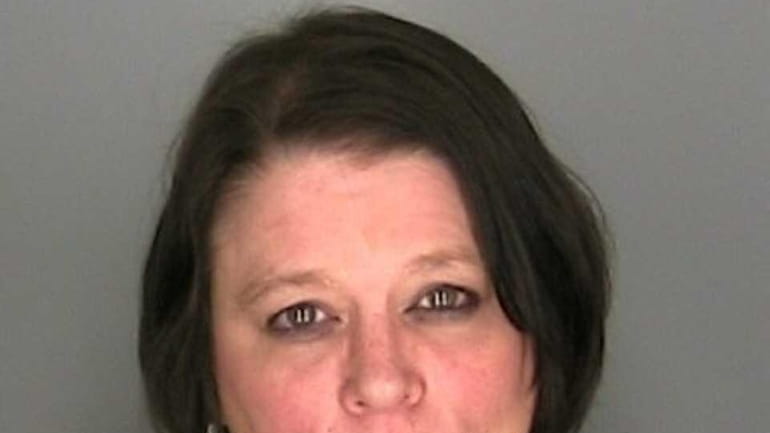 Betty Bjorkman, 56, of Glen Cove, who has been charged...