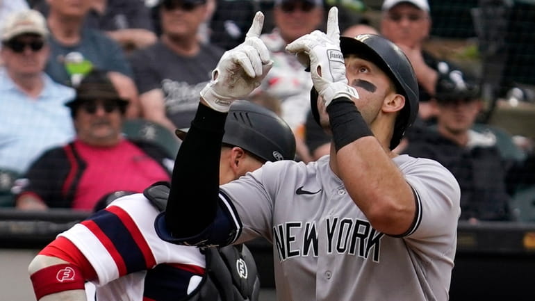 The Yankees' Joey Gallo, right, celebrates after hitting a two-run...