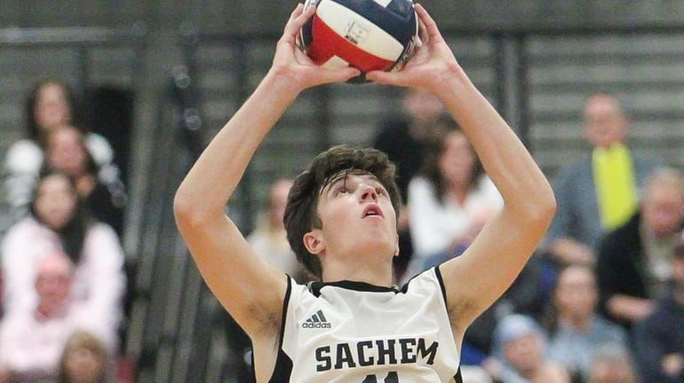 Sachem North's Jack Driscoll (11) plays the ball in the...