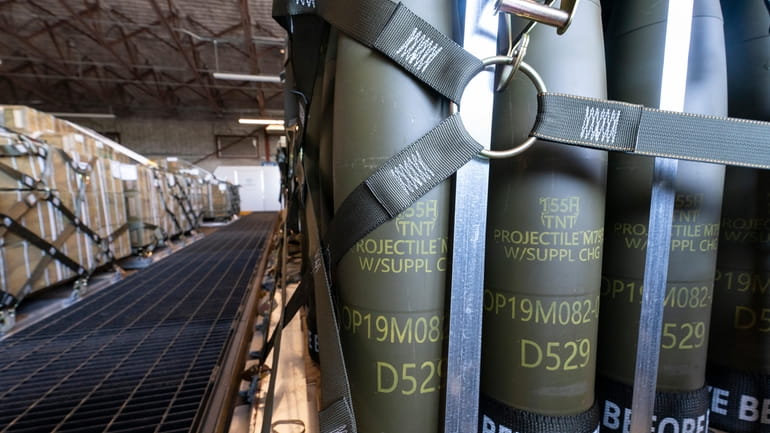 Pallets of 155 mm shells ultimately bound for Ukraine are...