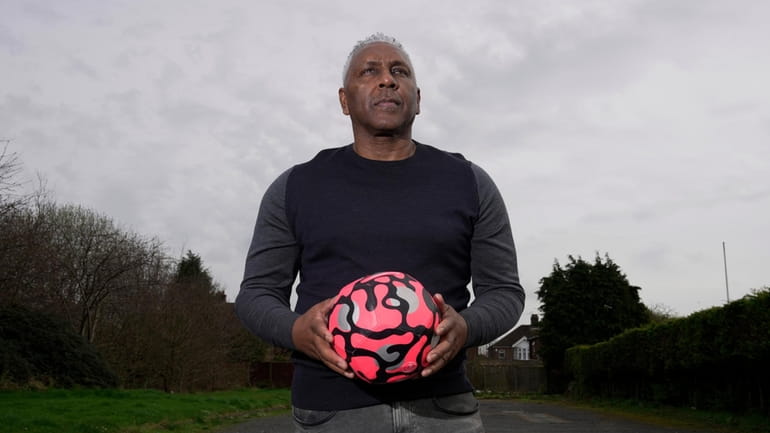 Former England international soccer player Ricky Hill poses for a...