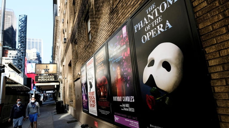 Broadway posters appear outside the Richard Rodgers Theatre during Covid-19...