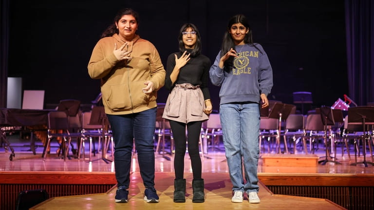 From left, East Meadow High School ninth-graders Hadia Haider, Giya...