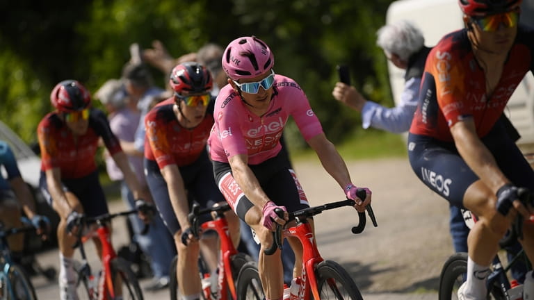 Geraint Thomas, wearing the pink jersey of leader of the...