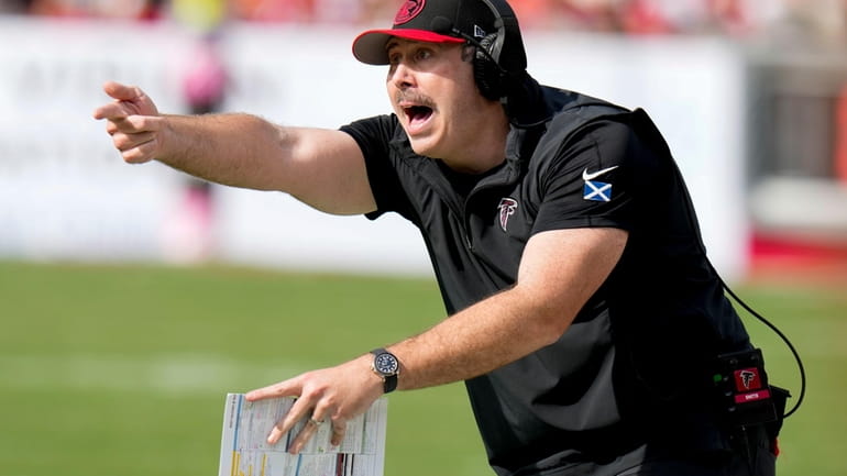 Atlanta Falcons coach Arthur Smith reacts to play against the...