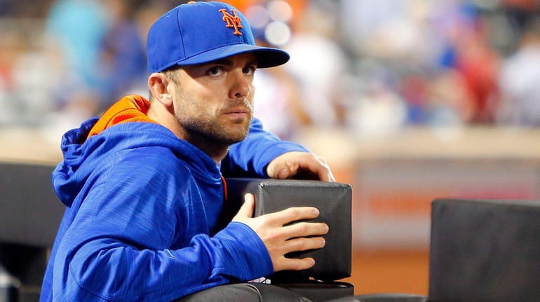 David Wright of the New York Mets looks on against...