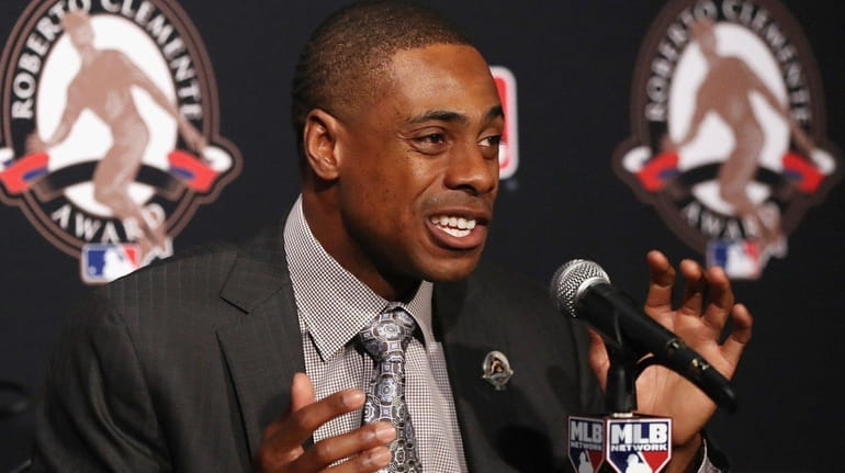 Curtis Granderson speaks to the media after being named the...