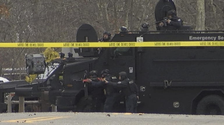 Suffolk County police during the standoff in Middle Island on Wednesday.