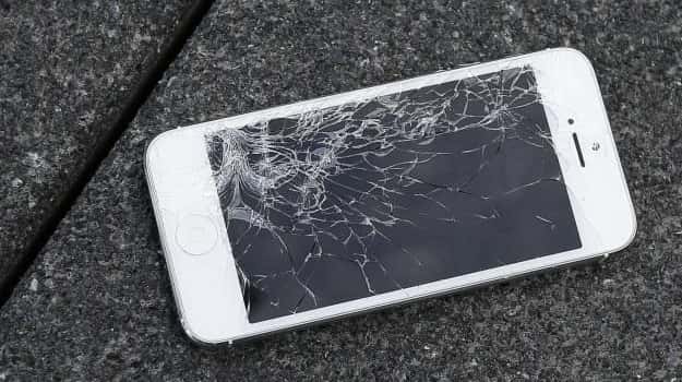 An Apple iPhone with a cracked screen after a drop...