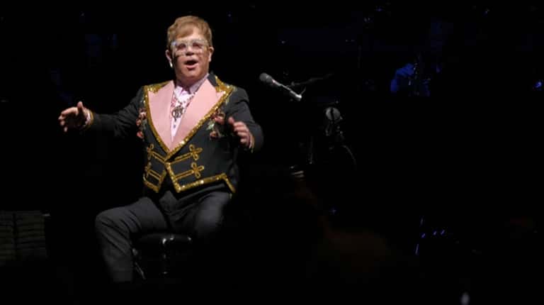 Elton John performs during his 'Farewell Yellow Brick Road' tour...
