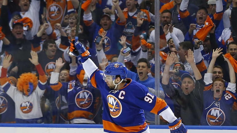 John Tavares of the New York Islanders celebrates his first-period...